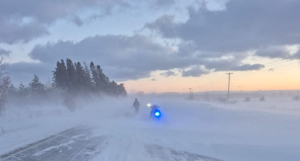 OPP SNOWMOBILES ASSISTING STRANDED MOTORISTS DURING SEVERE WEATHER