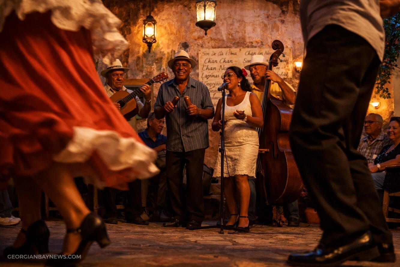 Professional editorial image illustrating Cuban Culture through music and dance. Interior courtyard in Trinidad at dusk,